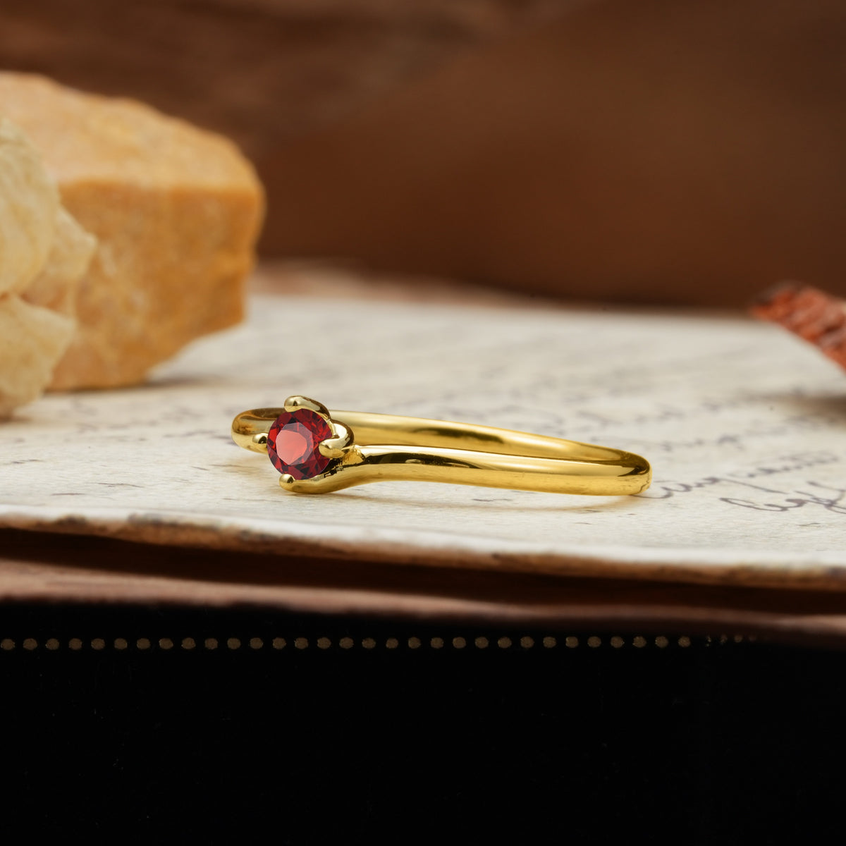 Classic and Minimalist 4-Prong Round-Cut Three-Stone Garnet Engagement Ring - Additional view