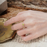 Classic and Minimalist 4-Prong Round-Cut Three-Stone Peridot Engagement Ring - Additional view