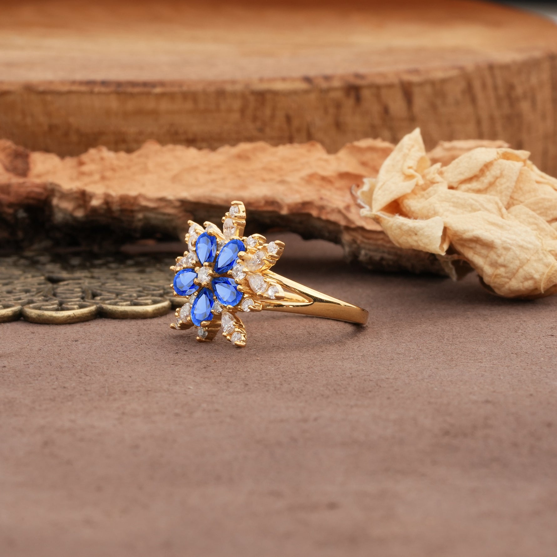 Unique and Luxurious Floral Design 4-Prong Pear Cut Sapphire Engagement Ring - Additional view