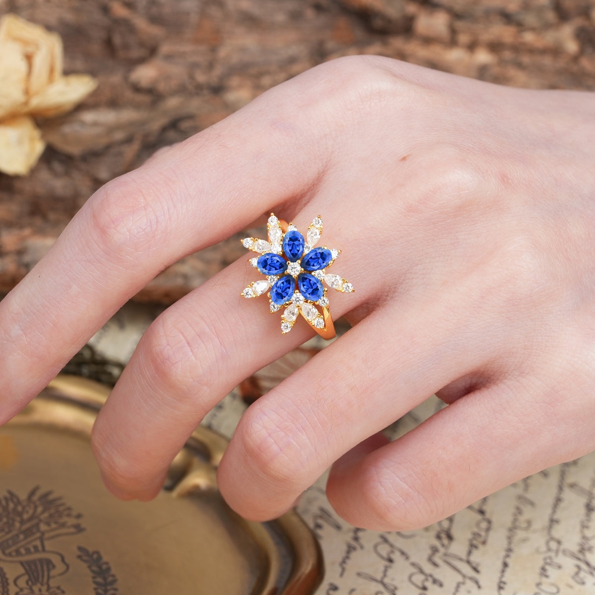 Unique and Luxurious Floral Design 4-Prong Pear Cut Sapphire Engagement Ring - Additional view