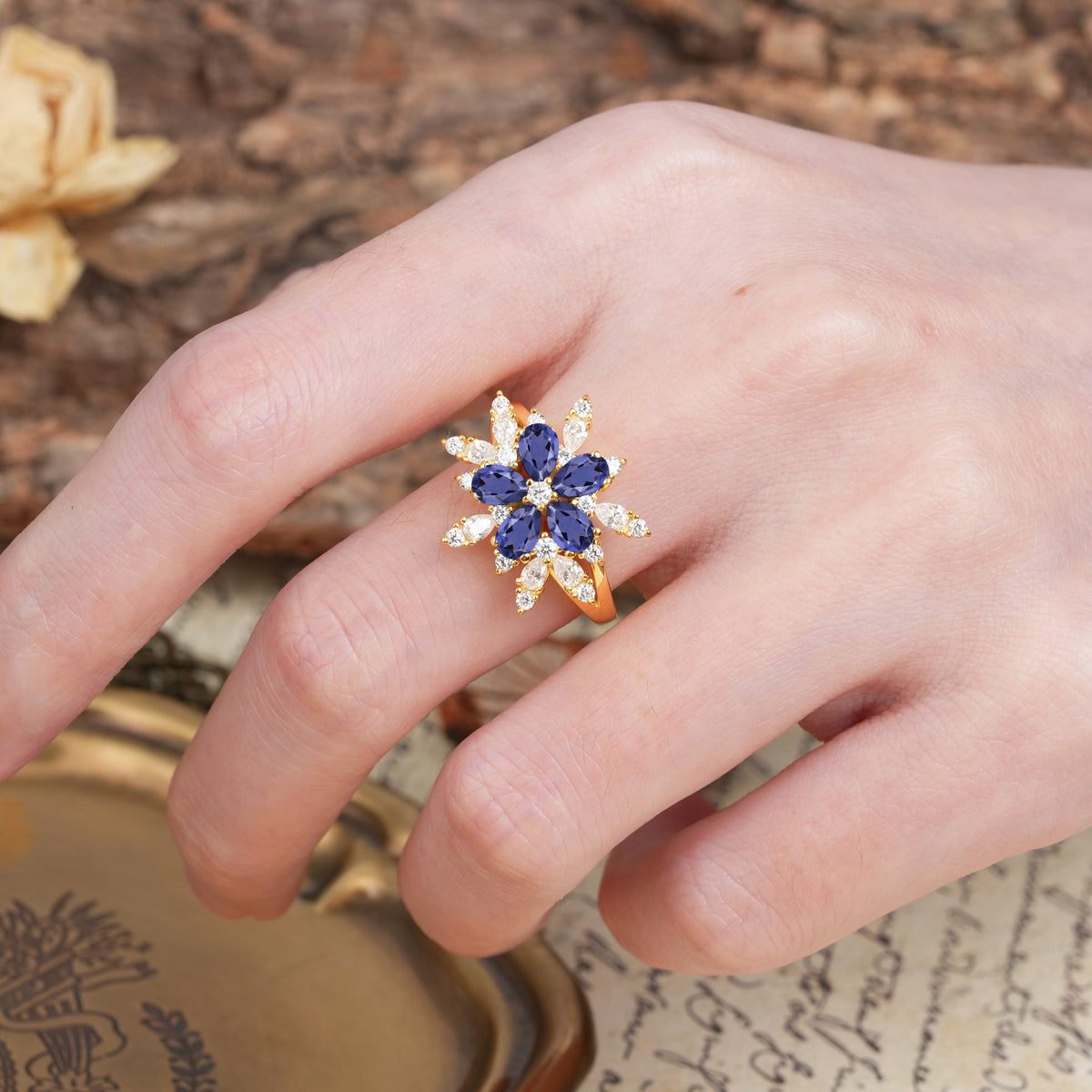 Unique and Luxurious Floral Design 4-Prong Pear Cut Tanzanite Engagement Ring - Additional view