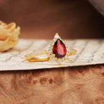 Vintage Classic 3-Prong Pear Cut Garnet Engagement Ring - Additional view