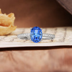 Luxurious and Unique 4-Prong Oval-Cut Sapphire Engagement Ring with Pavé Accents - Additional view