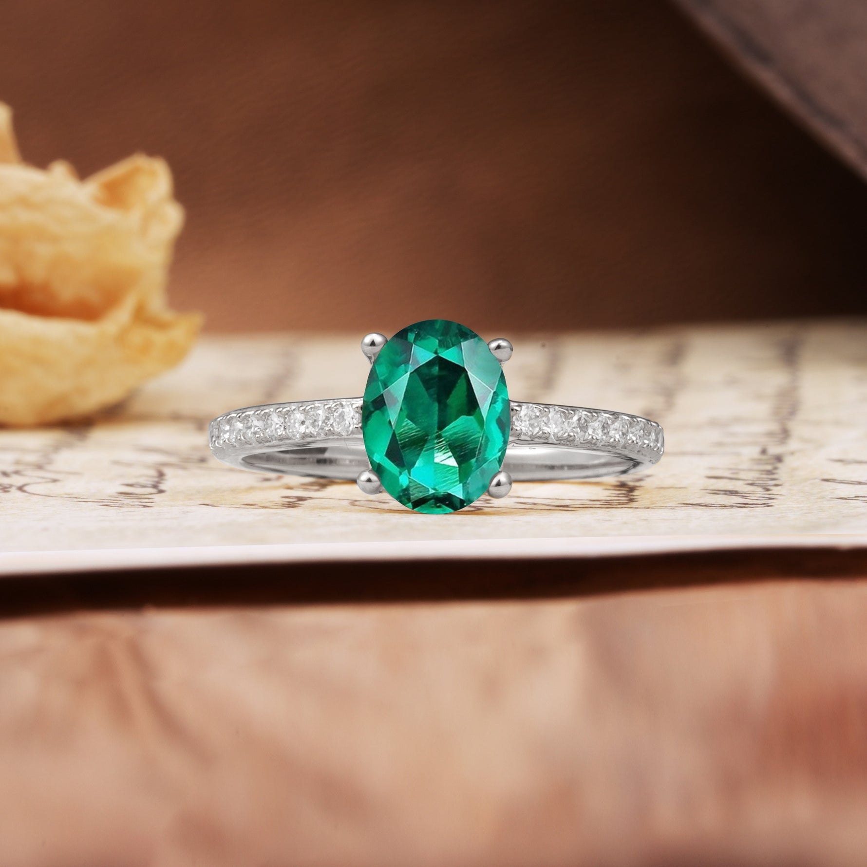 Luxurious and Unique 4-Prong Oval-Cut Emerald Engagement Ring with Pavé Accents - Additional view