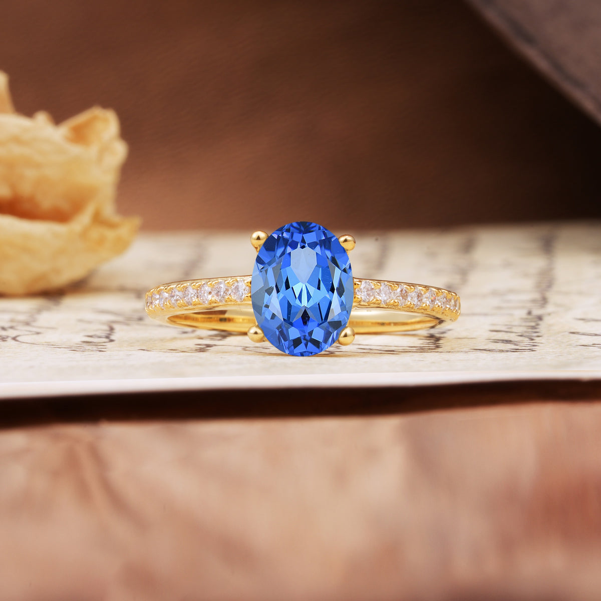 Luxurious and Unique 4-Prong Oval-Cut Sapphire Engagement Ring with Pavé Accents - Additional view