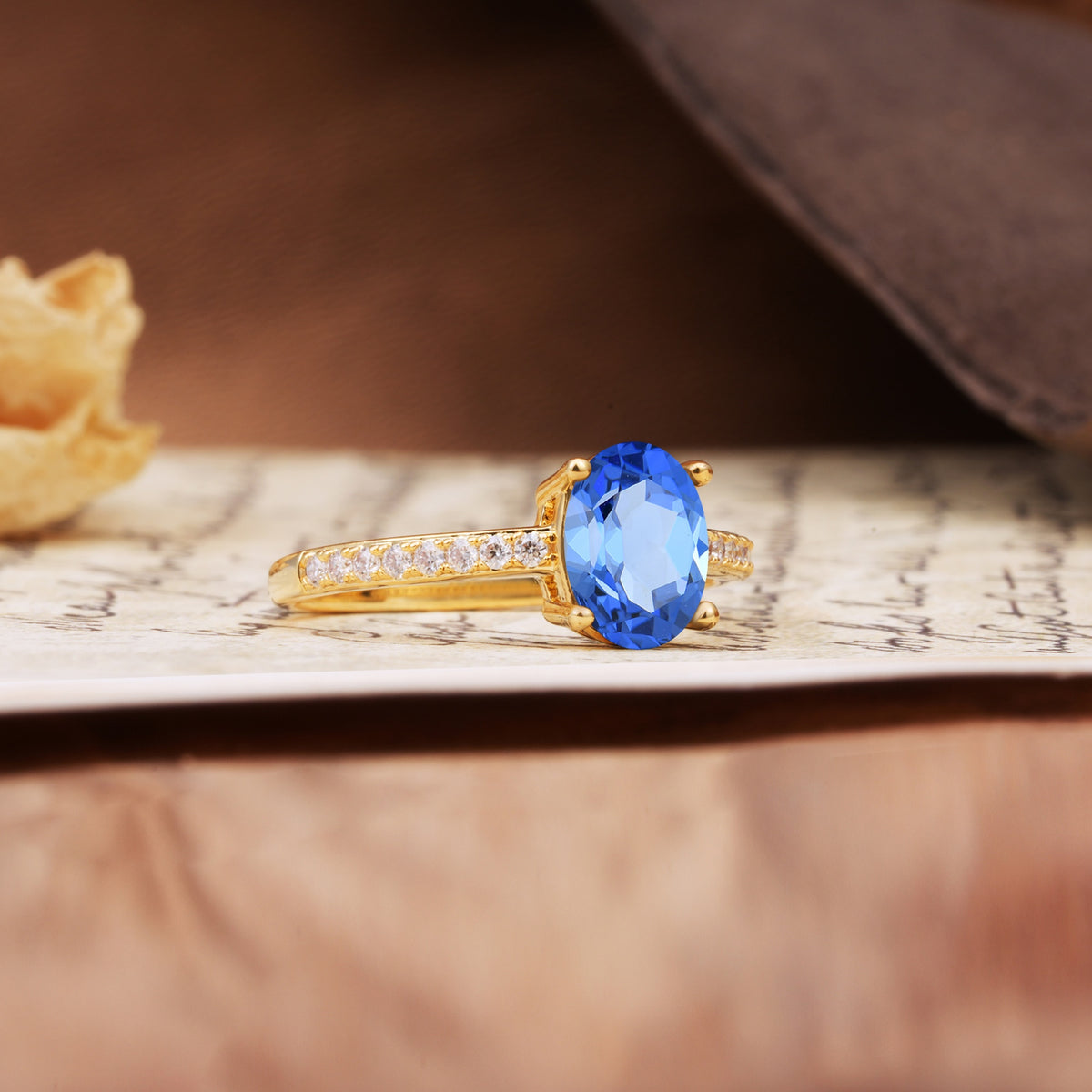 Luxurious and Unique 4-Prong Oval-Cut Sapphire Engagement Ring with Pavé Accents - Additional view