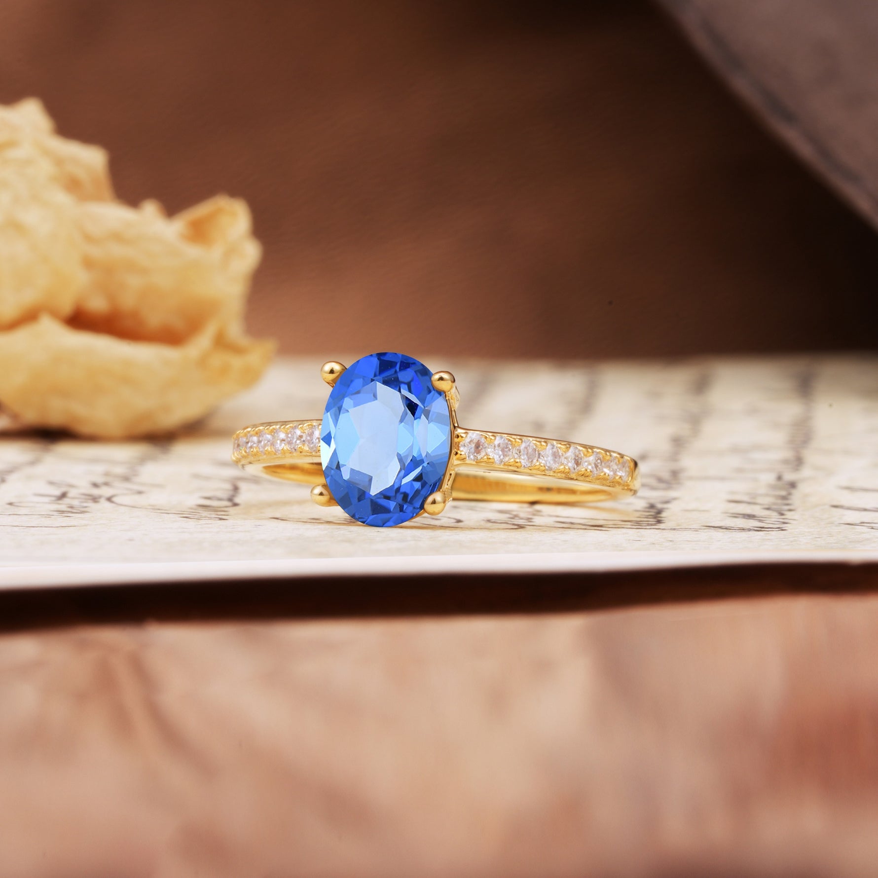 Luxurious and Unique 4-Prong Oval-Cut Sapphire Engagement Ring with Pavé Accents - Additional view