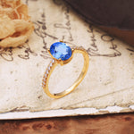 Luxurious and Unique 4-Prong Oval-Cut Sapphire Engagement Ring with Pavé Accents - Additional view