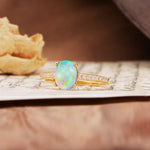 Luxurious and Unique 4-Prong Oval-Cut Fire Opal Engagement Ring with Pavé Accents - Additional view