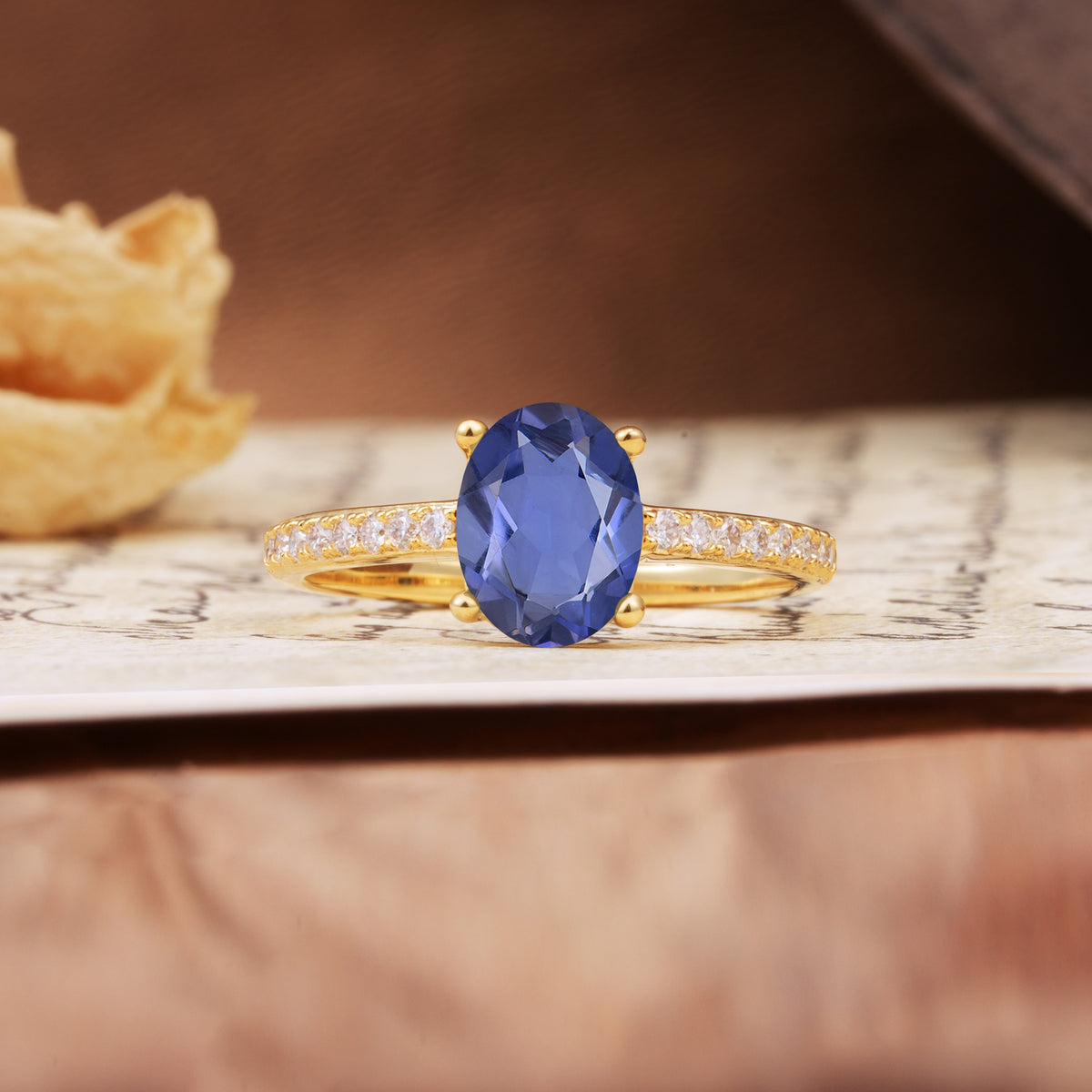 Luxurious and Unique 4-Prong Oval-Cut Tanzanite Engagement Ring with Pavé Accents - Additional view