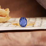 Luxurious and Unique 4-Prong Oval-Cut Tanzanite Engagement Ring with Pavé Accents - Additional view