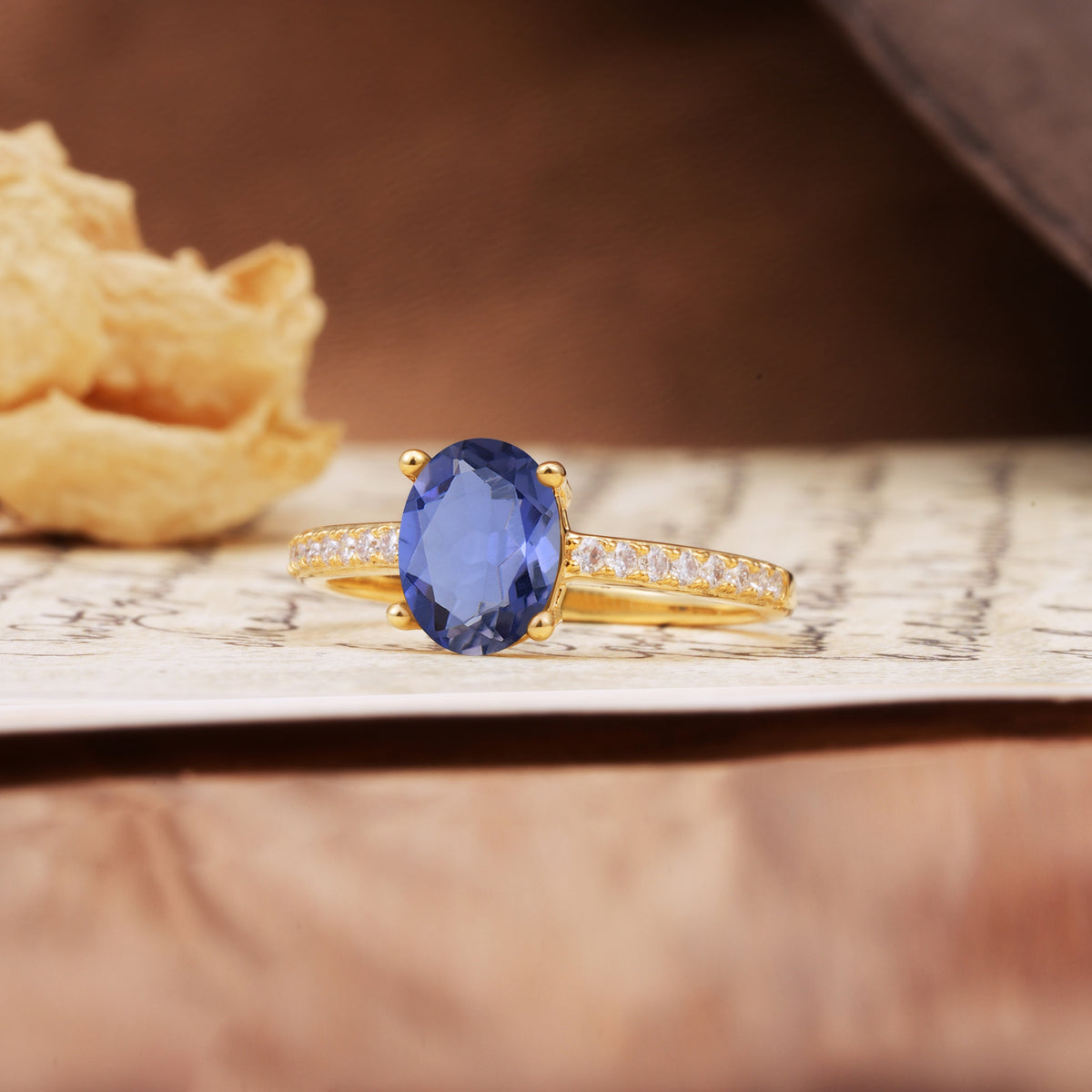 Luxurious and Unique 4-Prong Oval-Cut Tanzanite Engagement Ring with Pavé Accents - Additional view