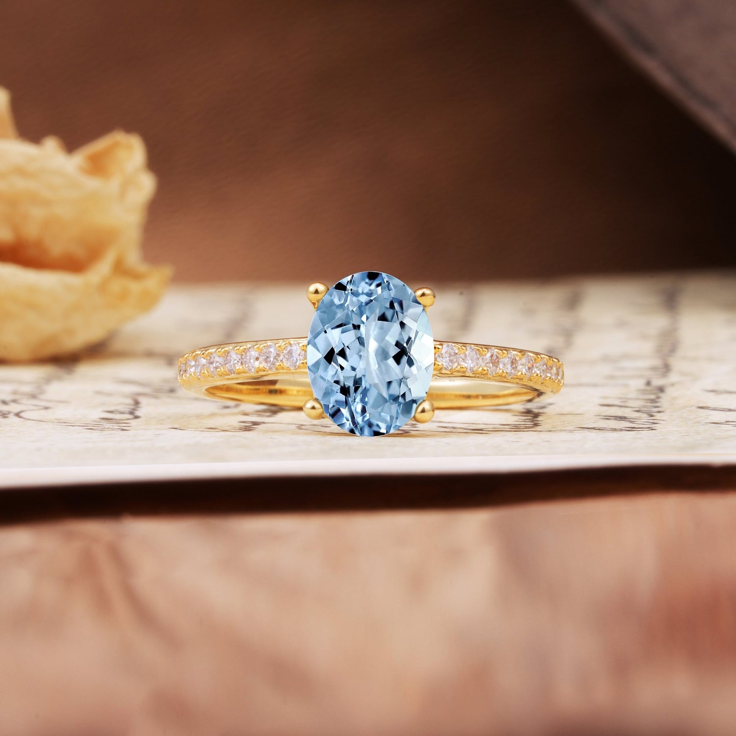 Luxurious and Unique 4-Prong Oval-Cut Aquamarine Engagement Ring with Pavé Accents