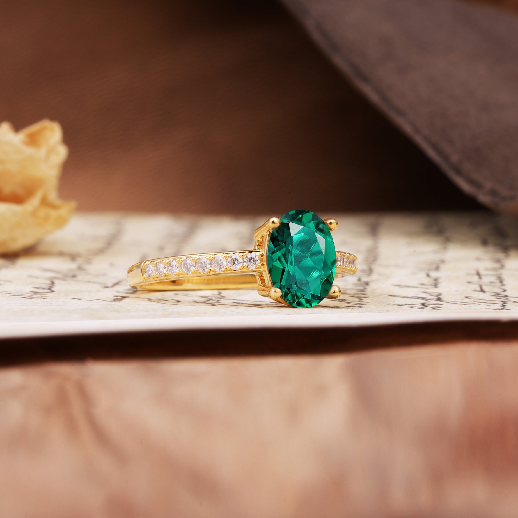 Luxurious and Unique 4-Prong Oval-Cut Emerald Engagement Ring with Pavé Accents - Additional view