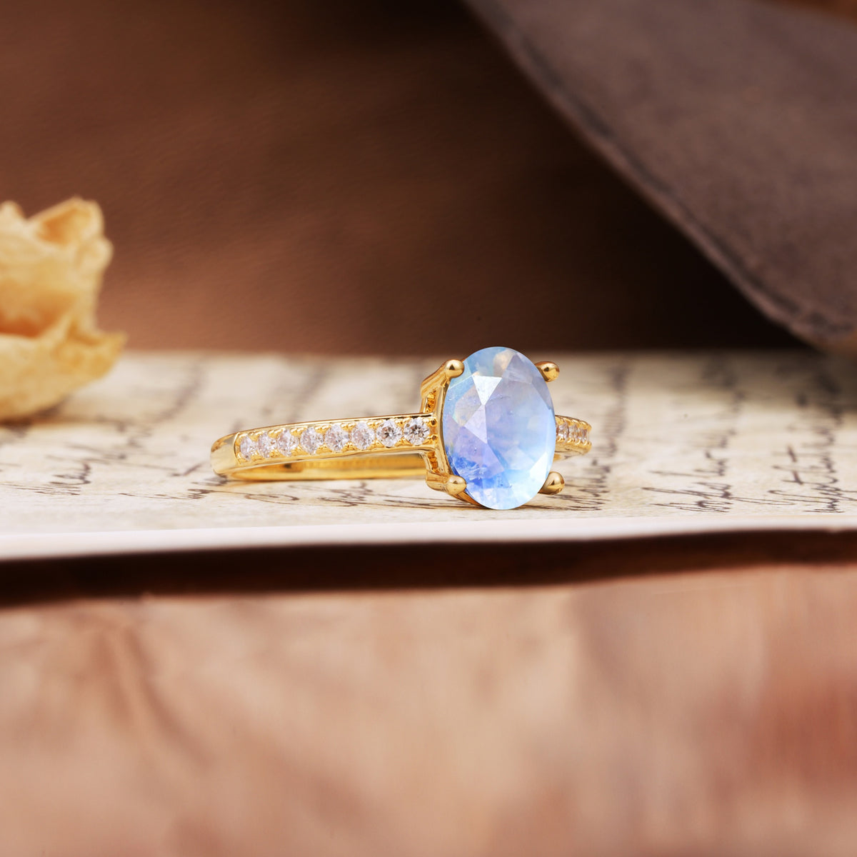 Luxurious and Unique 4-Prong Oval-Cut Moonstone Engagement Ring with Pavé Accents - Additional view