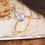 Luxurious and Unique 4-Prong Oval-Cut Moonstone Engagement Ring with Pavé Accents - Additional view
