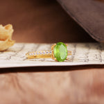 Luxurious and Unique 4-Prong Oval-Cut Peridot Engagement Ring with Pavé Accents - Additional view