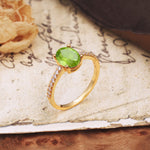 Luxurious and Unique 4-Prong Oval-Cut Peridot Engagement Ring with Pavé Accents - Additional view