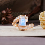 Unique Luxurious Twisted 4-Prong Emerald Cut Moonstone Engagement Ring - Additional view