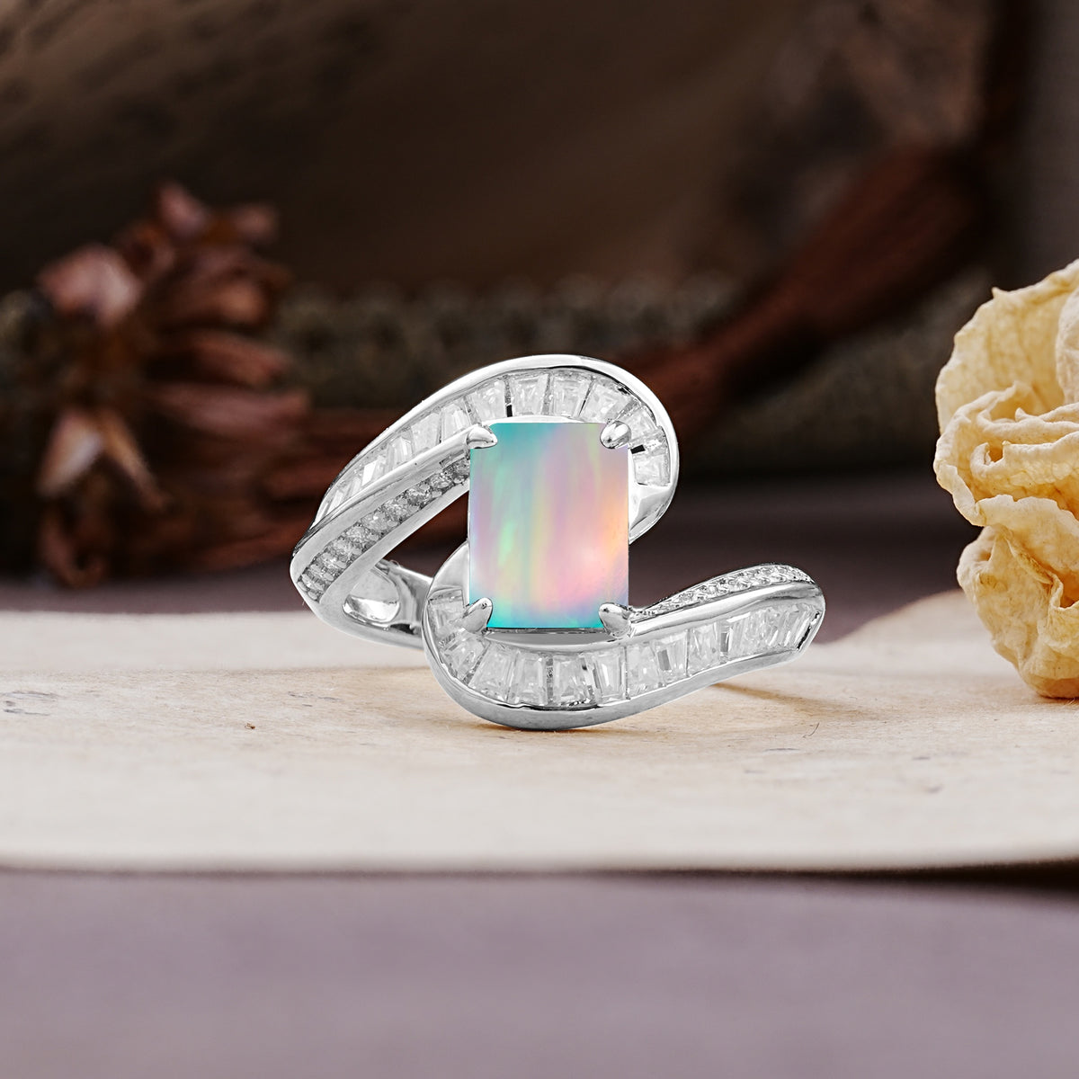 Unique Luxurious Twisted 4-Prong Emerald Cut Fire Opal Engagement Ring - Additional view