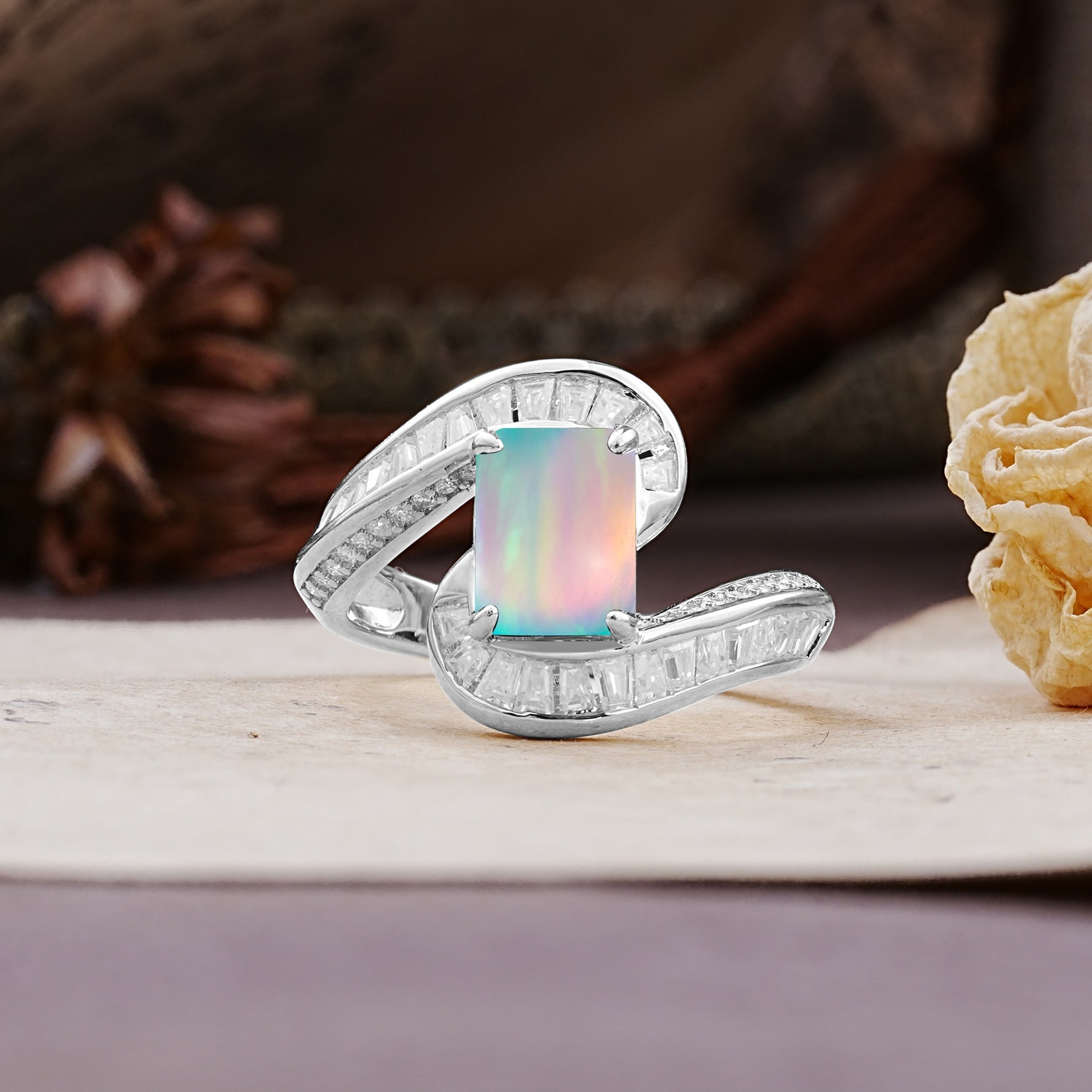 Unique Luxurious Twisted 4-Prong Emerald Cut Fire Opal Engagement Ring - Additional view