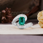 Unique Luxurious Twisted 4-Prong Emerald Cut Emerald Engagement Ring - Additional view