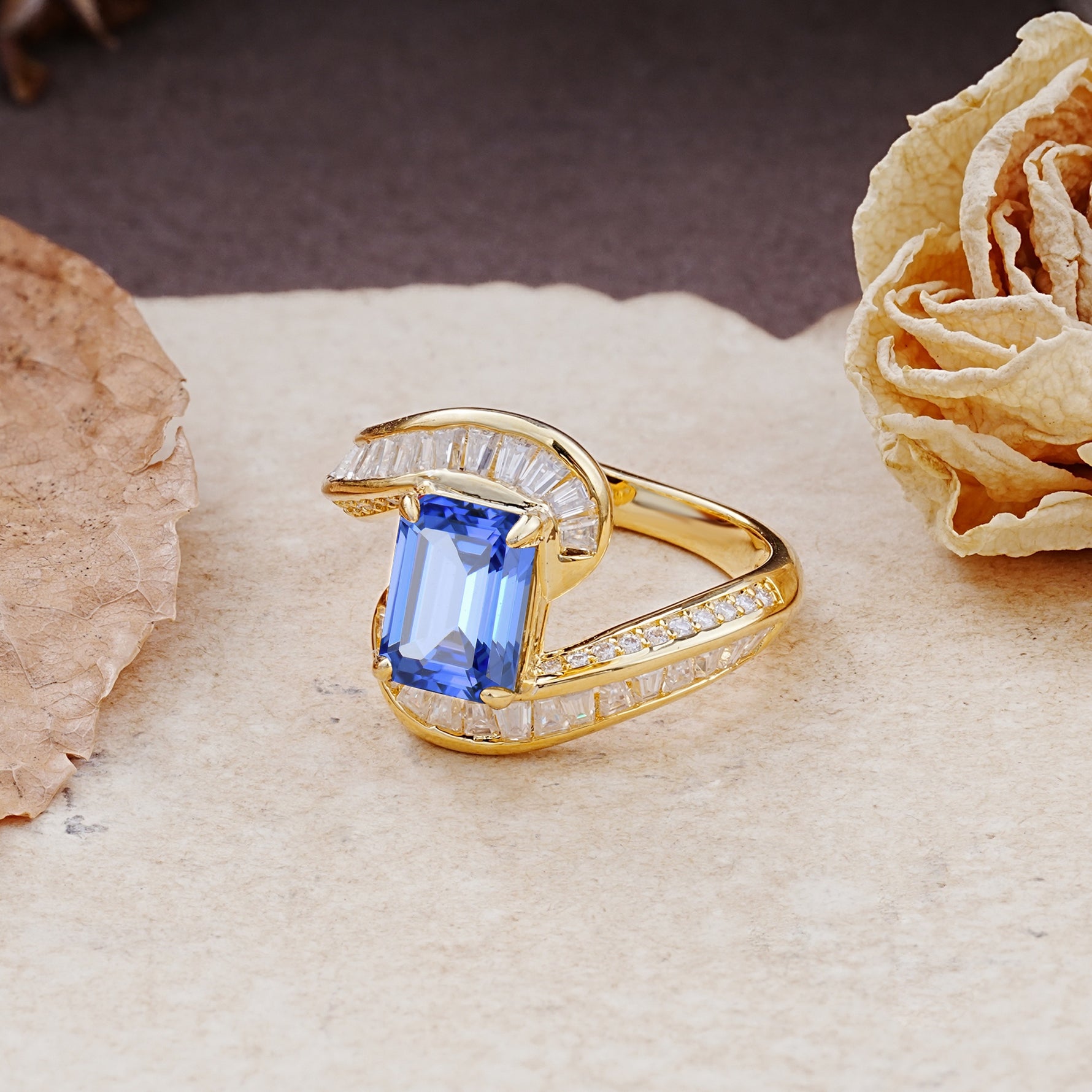 Unique Luxurious Twisted 4-Prong Emerald Cut Sapphire Engagement Ring - Additional view