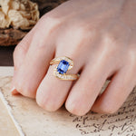 Unique Luxurious Twisted 4-Prong Emerald Cut Sapphire Engagement Ring - Additional view