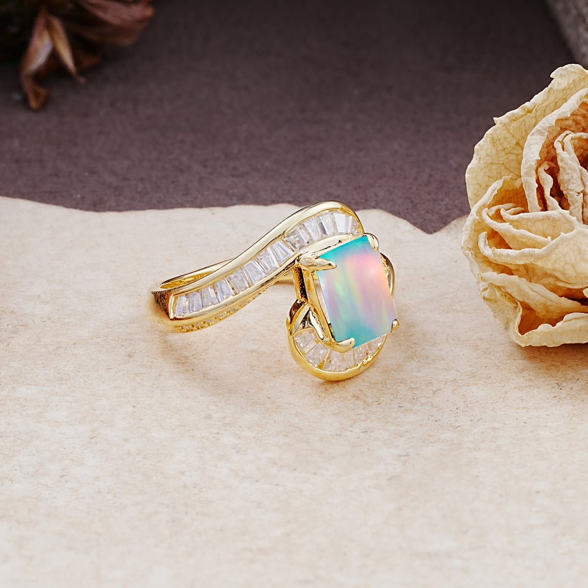 Unique Luxurious Twisted 4-Prong Emerald Cut Fire Opal Engagement Ring - Additional view
