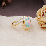 Unique Luxurious Twisted 4-Prong Emerald Cut Fire Opal Engagement Ring - Additional view
