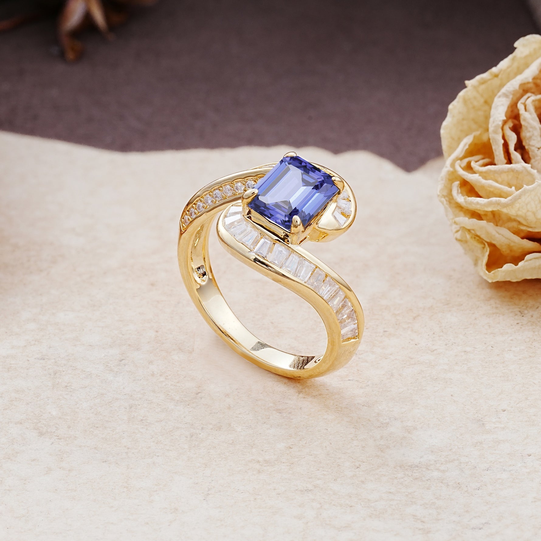 Unique Luxurious Twisted 4-Prong Emerald Cut Tanzanite Engagement Ring - Additional view