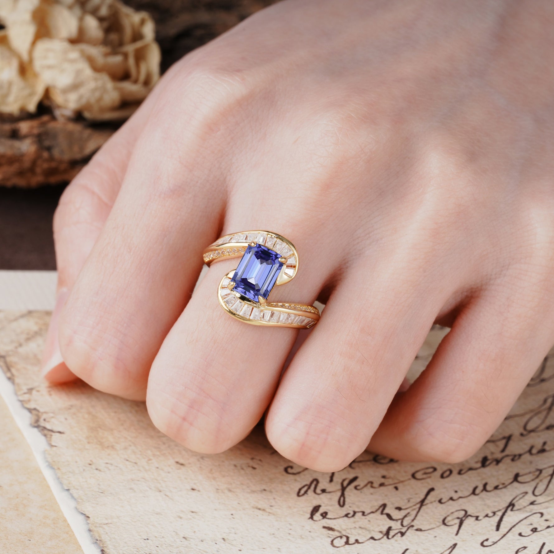 Unique Luxurious Twisted 4-Prong Emerald Cut Tanzanite Engagement Ring - Additional view