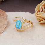 Unique Luxurious Twisted 4-Prong Emerald Cut Turquoise Engagement Ring - Additional view