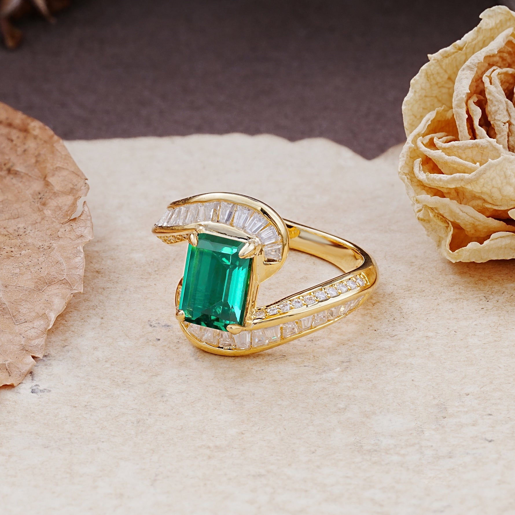 Unique Luxurious Twisted 4-Prong Emerald Cut Emerald Engagement Ring - Additional view