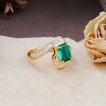 Unique Luxurious Twisted 4-Prong Emerald Cut Emerald Engagement Ring - Additional view