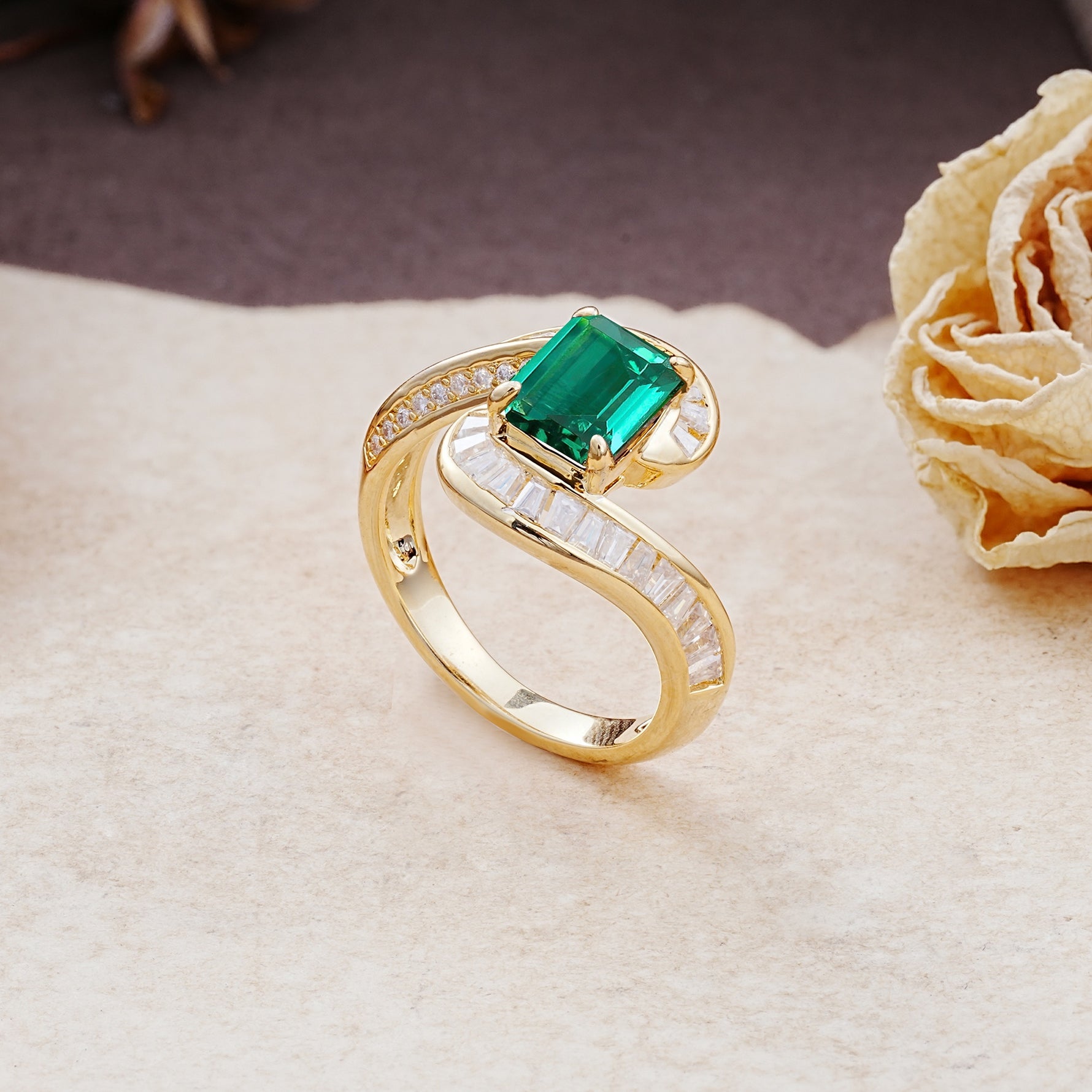 Unique Luxurious Twisted 4-Prong Emerald Cut Emerald Engagement Ring - Additional view