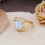 Unique Luxurious Twisted 4-Prong Emerald Cut Moonstone Engagement Ring - Additional view