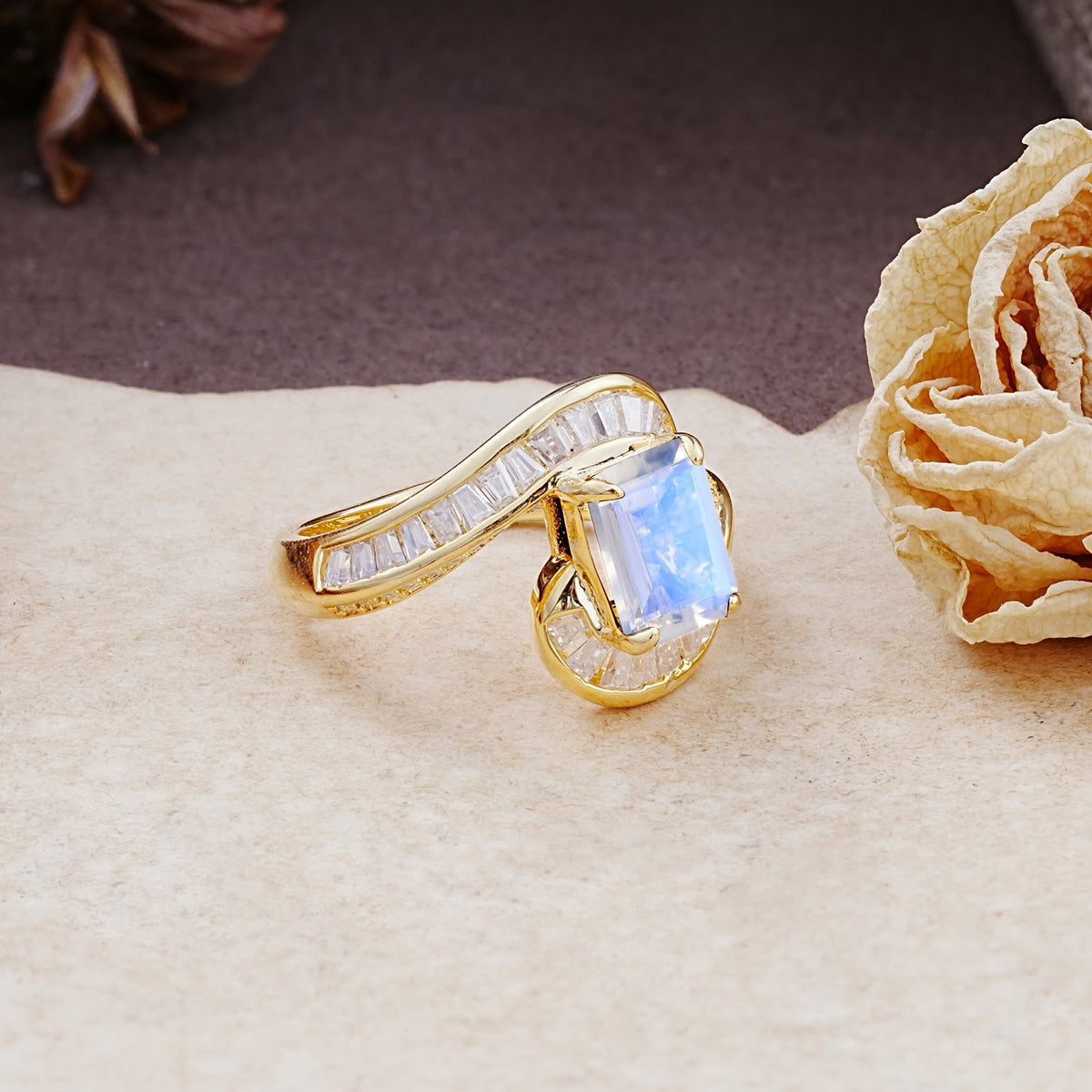 Unique Luxurious Twisted 4-Prong Emerald Cut Moonstone Engagement Ring - Additional view