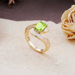 Unique Luxurious Twisted 4-Prong Emerald Cut Peridot Engagement Ring - Additional view