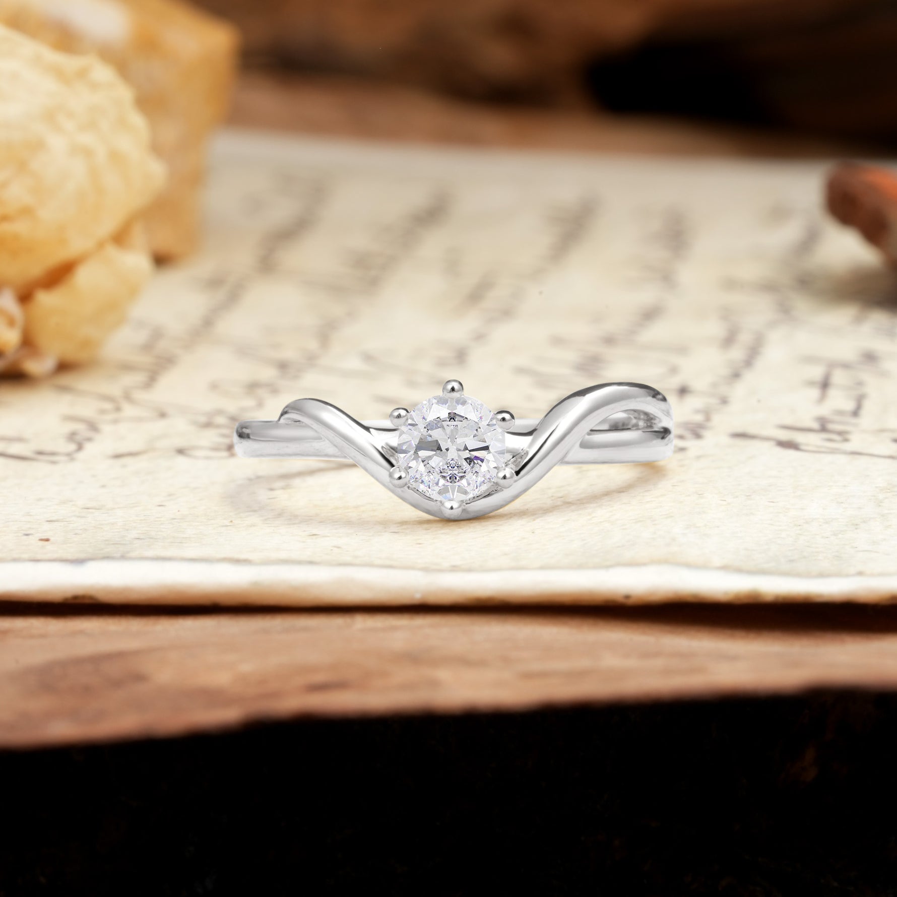 Minimalist Twisted Six-Prong Round-Cut Moissanite Engagement Ring - Additional view