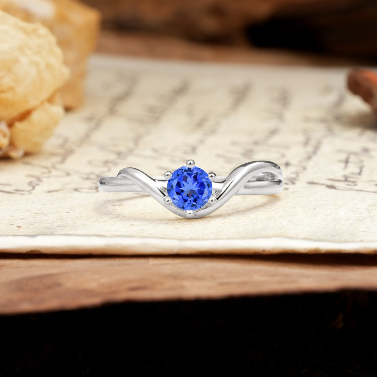 Minimalist Twisted Six-Prong Round-Cut Sapphire Engagement Ring - Additional view