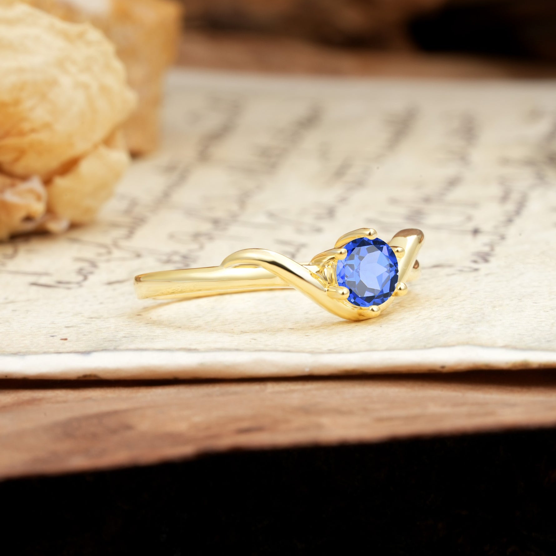 Minimalist Twisted Six-Prong Round-Cut Sapphire Engagement Ring - Additional view