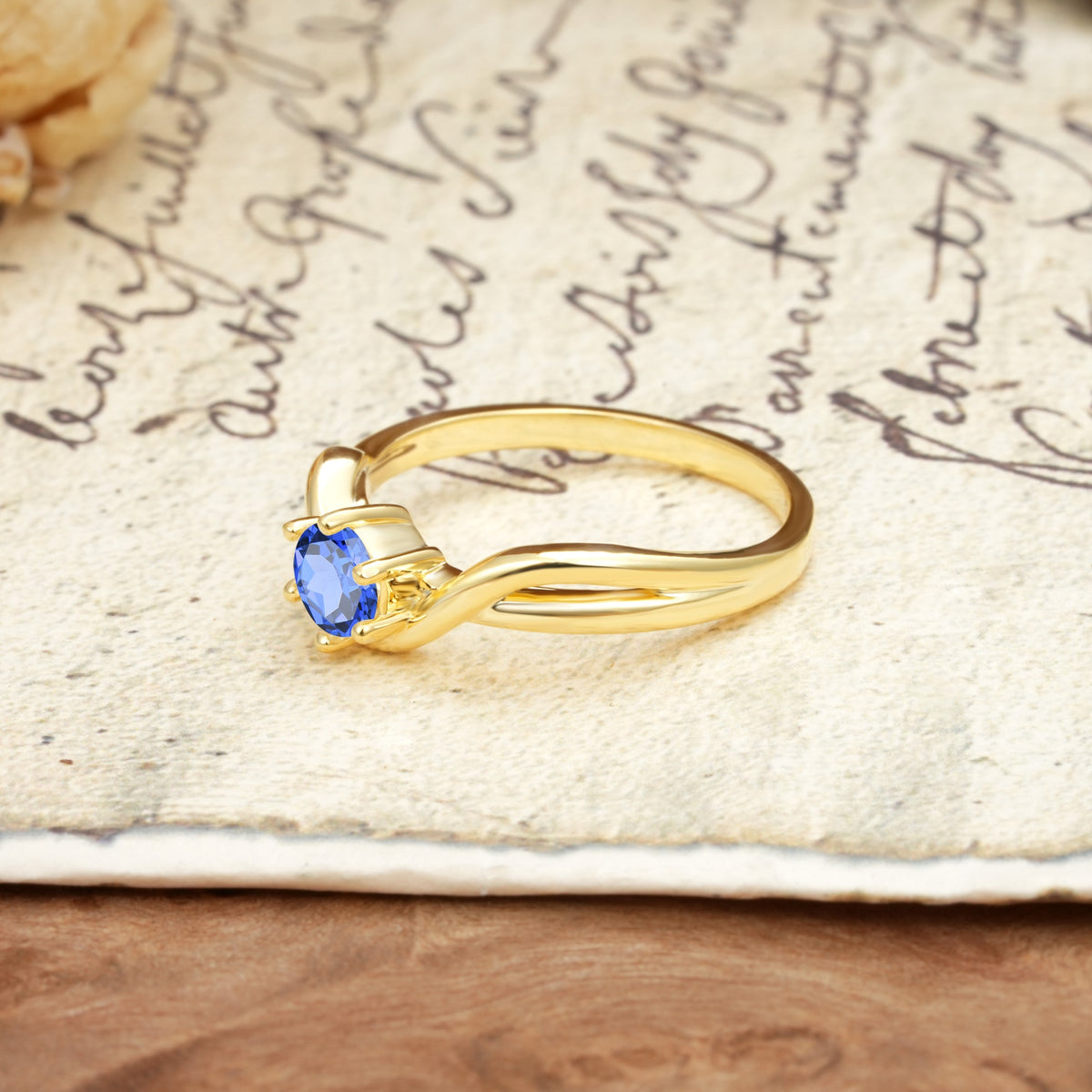 Minimalist Twisted Six-Prong Round-Cut Sapphire Engagement Ring - Additional view