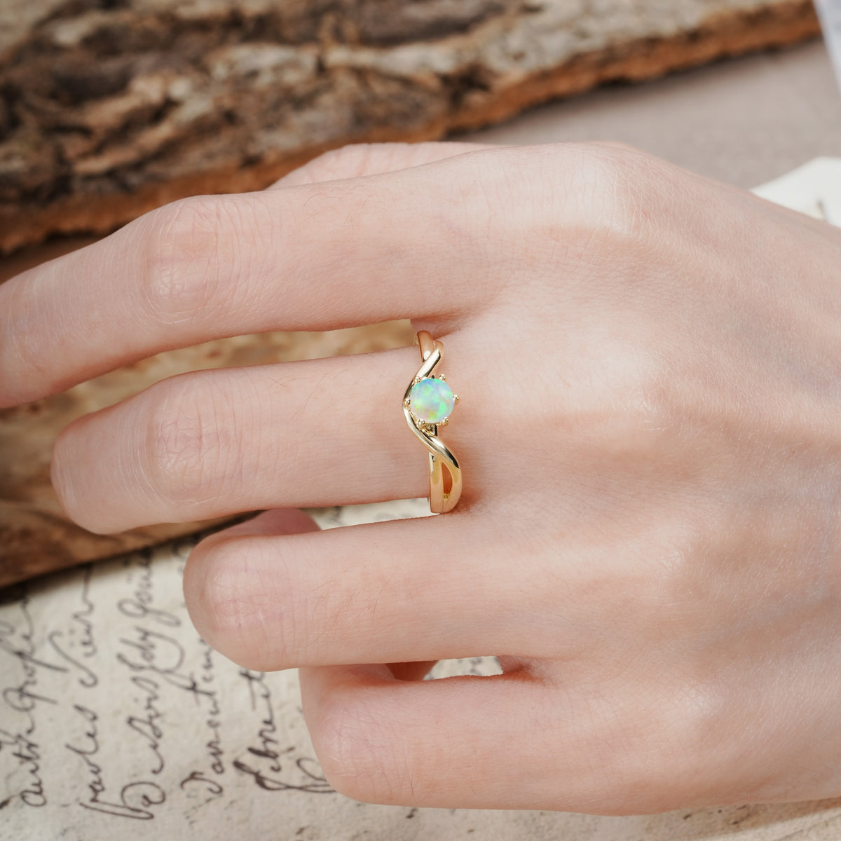 Minimalist Twisted Six-Prong Round-Cut Fire Opal Engagement Ring - Additional view