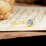 Minimalist Twisted Six-Prong Round-Cut Aquamarine Engagement Ring - Additional view