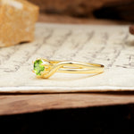 Minimalist Twisted Six-Prong Round-Cut Peridot Engagement Ring - Additional view