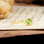 Minimalist Twisted Six-Prong Round-Cut Peridot Engagement Ring - Additional view