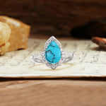 Unique, Luxurious, and Vintage 4-Prong Pear Cut Turquoise Engagement Ring - Additional view