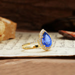 Unique, Luxurious, and Vintage 4-Prong Pear Cut Sapphire Engagement Ring - Additional view