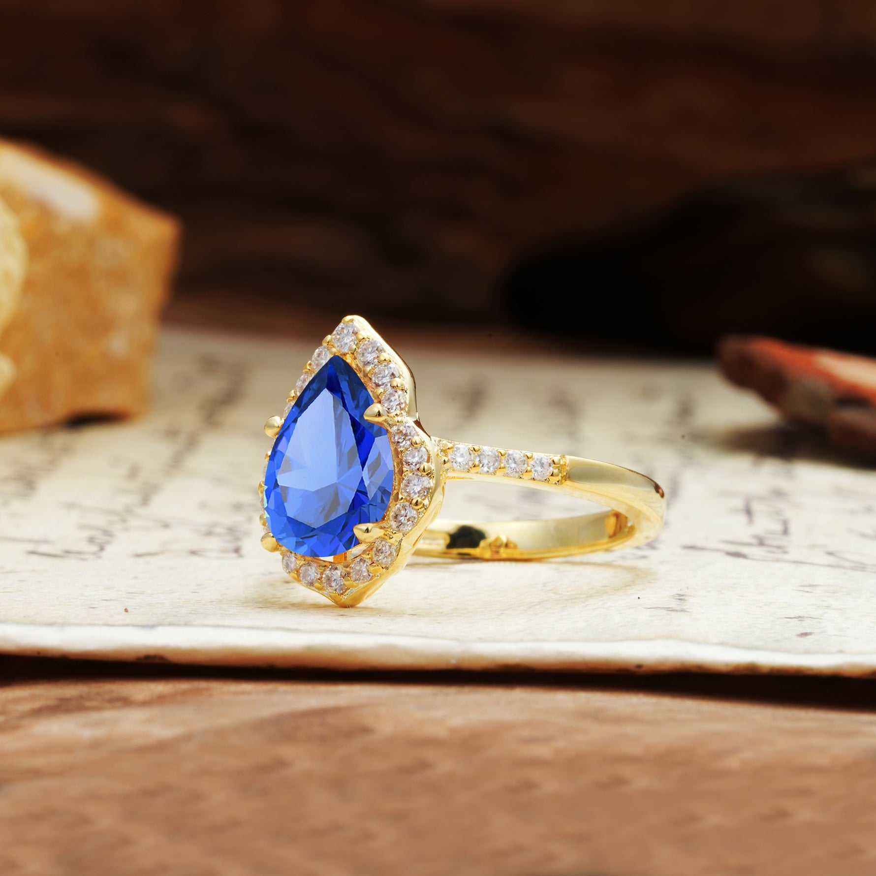 Unique, Luxurious, and Vintage 4-Prong Pear Cut Sapphire Engagement Ring - Additional view